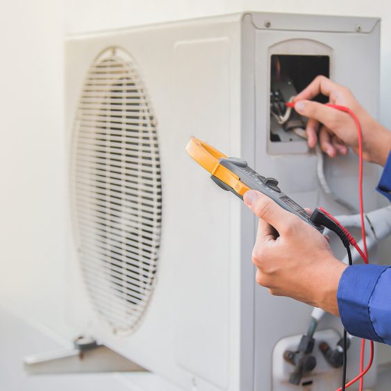 Air conditioner maintenance in progress.